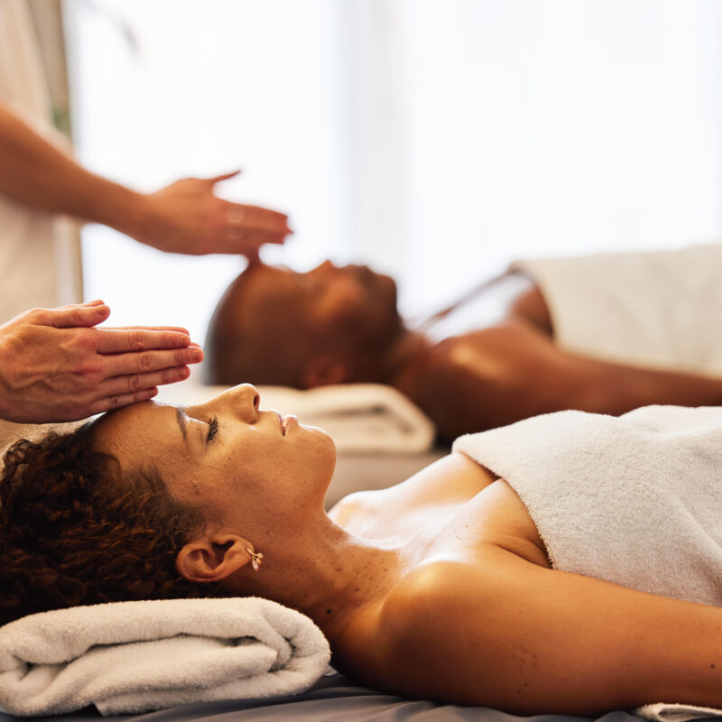 People receiving relaxing massage therapy.