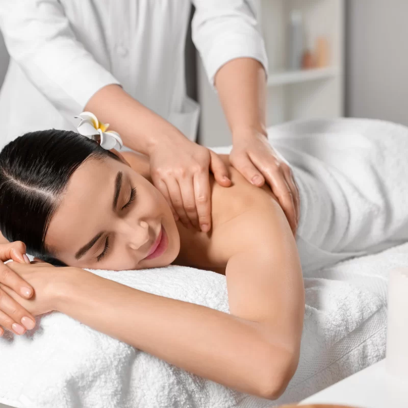 Person receiving relaxing back massage at spa