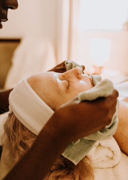 Facial treatment in spa setting for relaxation.